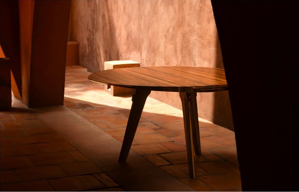 wood round table design with gold metal details