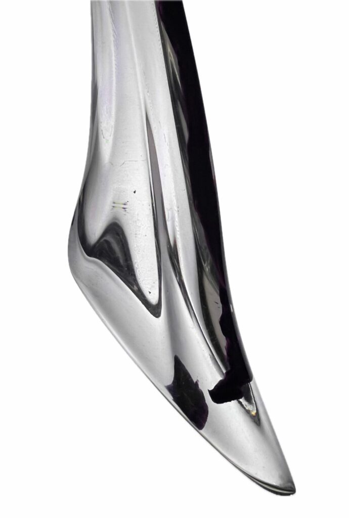 Purple HIV-containing blood residue encapsulated in resin